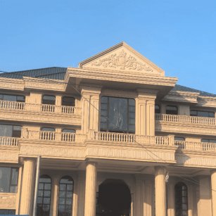 韶关黄金麻别墅外墙干挂石材效果示例