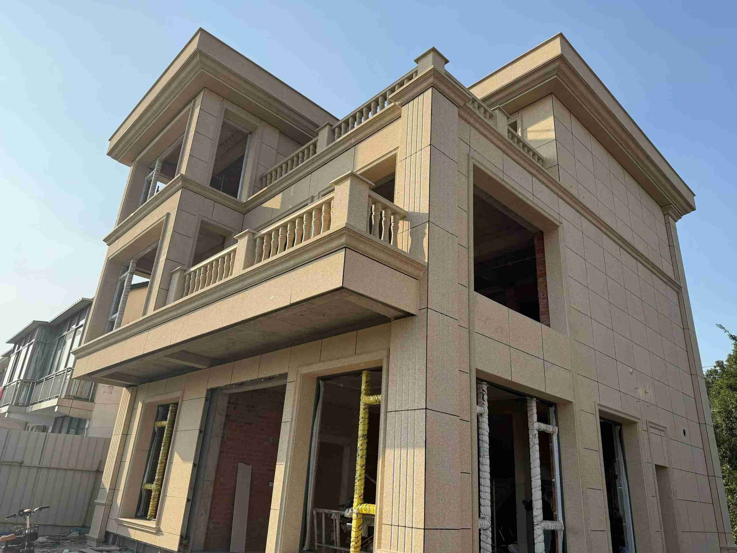 韶关 黄金麻花岗岩石材荔枝面外墙干挂效果展示